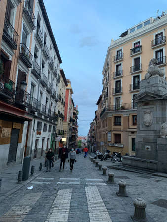 Madrid, Spain - May12-19 2020: Madrid street life, with people and buildings  after the total lockdown in Madrid due to Coronavirus (COVID-19) infectious diseaseのeditorial素材