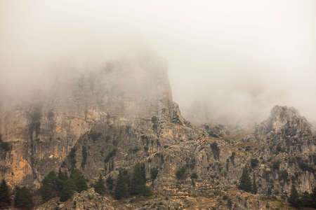 Mountain trails in the mist during winter time going from Cazorla, Jaen, Andalusia