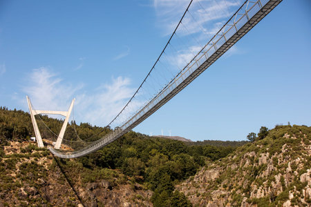 Arouca, Portugal - August 6, 2021 - The 516 Arouca Bridge, largest pedestrian suspension bridge in the world, suspended 175 m above the Paiva River, in Arouca, Aveiro, Portugal on August 6th, 2021のeditorial素材