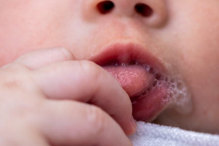 Close-up of a newborn baby with focus on different body partsの写真素材