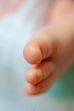 Close-up of a newborn baby with focus on different body partsの写真素材