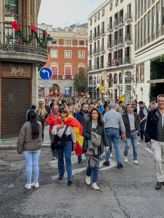 Madrid, Spain - November 12: Protesters at a demonstration against the amnesty for Catalan separatists given by prime-minister Pedro Sanchez, in Puerta de Sol in Madrid, Spain on November 12, 2023のeditorial素材