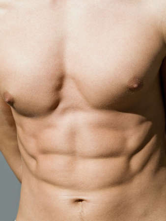 Well muscled body of the young man with good sunburnの写真素材