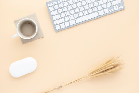 Office desk table top view with office supply, Beige table with copy space, Beige color workplace...