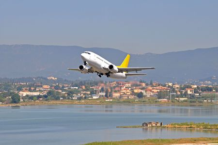 An aircraft taking off from the airport at Corfu, Greece.の写真素材