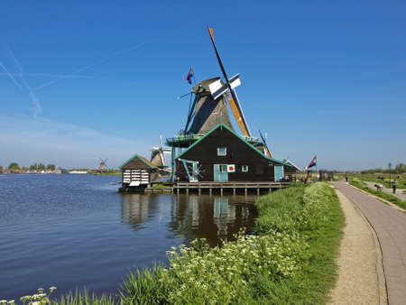 Ethnographic Museum of the province of North Holland - Zaanse Schans  Windmills on the lake  A sunny day の写真素材