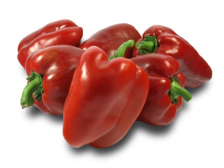 A bunch of six fresh red bell peppers. Isolation on a white background.の写真素材