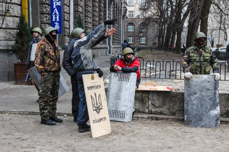 Kiev, Ukraine - February 22, 2014: A group of self-defense discussing something after the cessation of military actions.
のeditorial素材