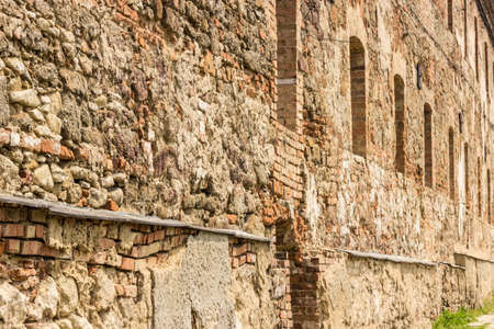 Fortress Wall, built of stone and brick, of the monastery of the Order of Discalced Carmelites of the 17th century. City Berdichev, Ukraine.の写真素材