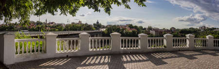Panorama of the old town and the bridge Novoplanivskyy from the observation deck at the edge of the canyon. National Historical and Architectural Reserve Kamenetz-Podolsk, Ukraine.の写真素材