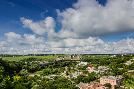 General view of the city Kamenetz-Podolsk with a medieval fortress in the center. National Historical and Architectural Reserve Kamenetz-Podolsk, Ukraine.の写真素材