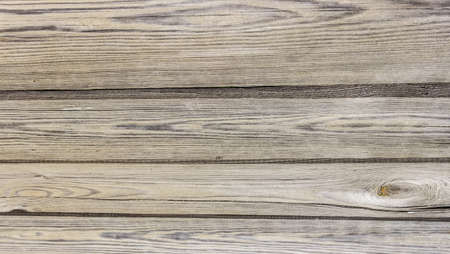 Surface from an old crannied and blackened by time wooden planks. Texture.の写真素材
