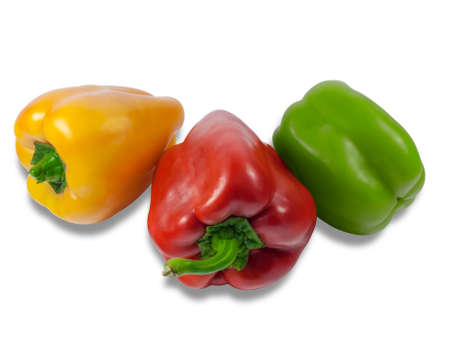Yellow, red and green fresh bell peppers on a light background. Isolation.の写真素材