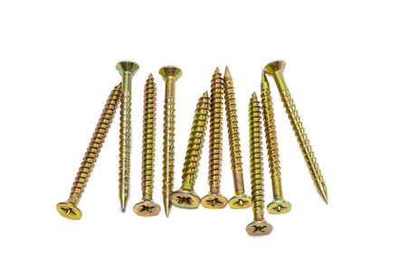 Several long wood screws, covered with a yellow protective anticorrosion coating of zinc...