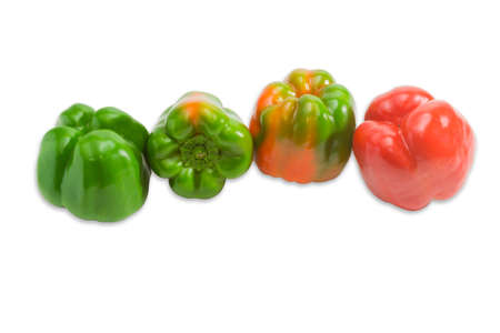 Green, yellow and red fresh bell peppers on a light background. Isolation.の写真素材