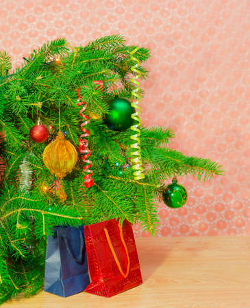 Fragment of a decorated Christmas trees and Christmas Giftsの写真素材