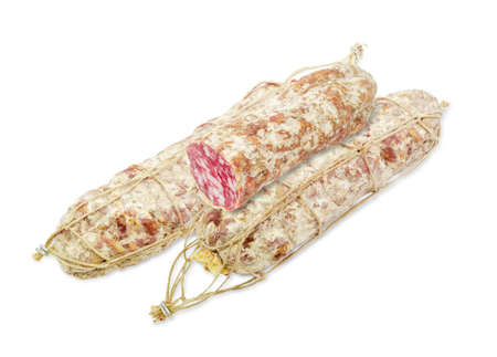 Two whole italian salamis, each tied by twine and cut off part of salami on a light backgroundの写真素材