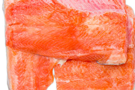 Several pieces of fresh uncooked fillet of rainbow trout closeupの写真素材