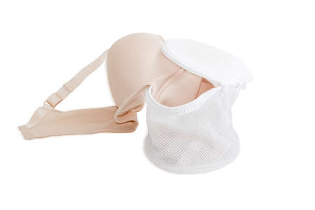 Special laundry bag for washing bras in washing machine on a light backgroundの写真素材