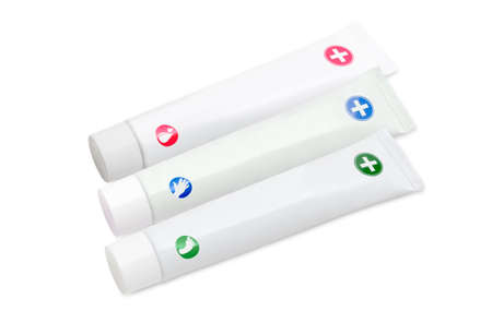 Three white tubes of moisturizer cream for skin care,  cream for hand and cream for feet on a light backgroundの写真素材