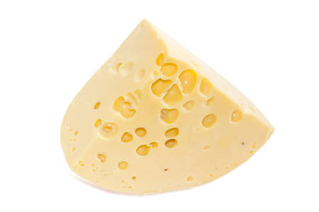 Piece of the medium-hard Swiss cheese with cheese's eyes on a light backgroundの写真素材