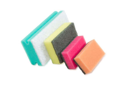 Several synthetic cleaning sponges with layer for more intense scrubbing different colors and sizes on a light backgroundの写真素材