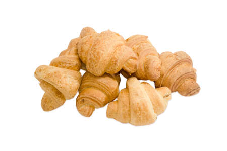 Several baked croissants on a light backgroundの写真素材