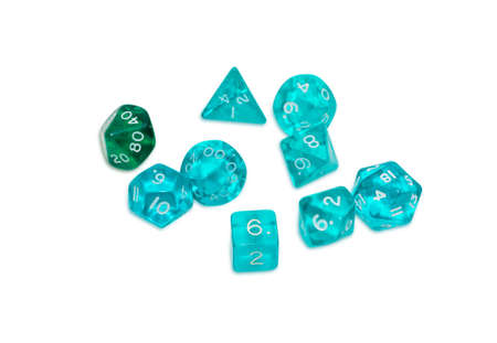 Set of blue and green specialized polyhedral dice with numbers used in role-playing games on a light backgroundの写真素材