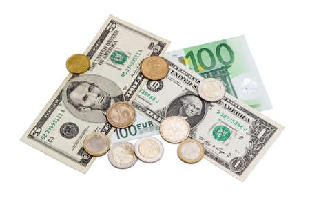 Several banknotes and coins different denominations euro and United States dollars on a light...