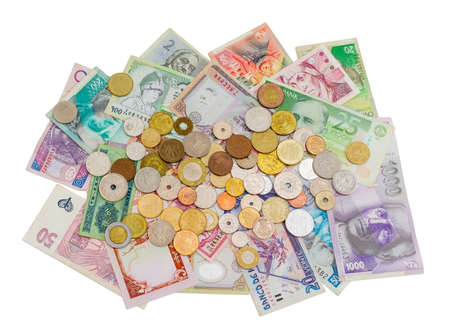 Banknotes and coins from various countries in circulation at different times on a light backgroundの写真素材
