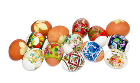 Several Easter eggs with a different patterns, decorating and drawings on a light backgroundの写真素材