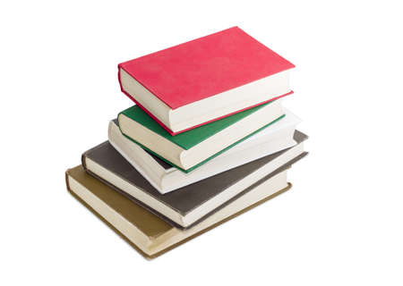 Stack of several books different formats and cover design on a light backgroundの写真素材