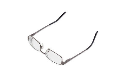 Modern pair of women's eyeglasses with single vision lenses and metal frame on a light backgroundの写真素材