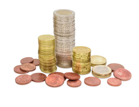 Euro coins from one cents to two euro on a light background, coins some denominations are stacked in columnsの写真素材