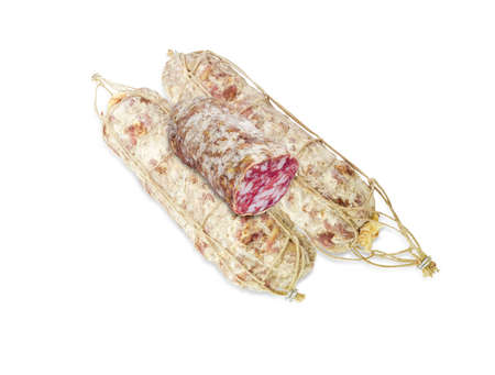 Two whole italian salami, tied with twine and one cut salami on a light backgroundの写真素材