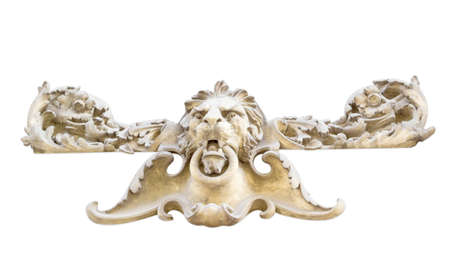 Isolated element of the architectural design of the building facade in the form of a lion head with a ring in his teethの写真素材