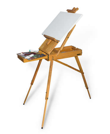 Wooden easel tripod design with blank canvas and painting tool on a light backgroundの写真素材