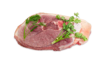 Big piece of fresh uncooked pork obtained from the cross cut of hind leg and twigs of fresh cilantro and dill on a light backgroundの写真素材