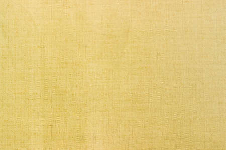 Background of a burlap made of unpainted spinning natural fibers closeupの写真素材