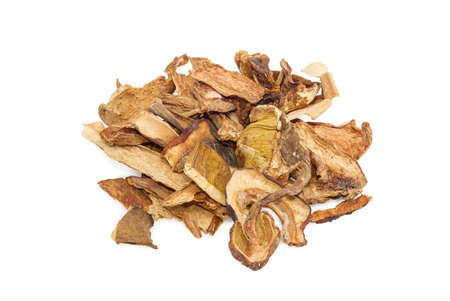 Small pile of dried Boletus edulis on a light backgroundの写真素材