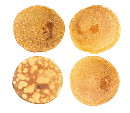 Texture of a four different round thin pancakes on a light backgroundの写真素材