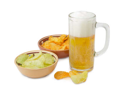 Beer glassware with lager beer, potato chip flavored paprika and wasabi in two different ceramic bowls and several potato chips separately beside on a light background
の写真素材