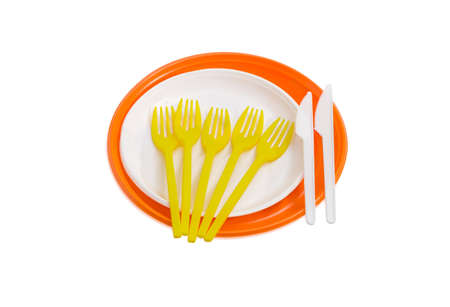 Orange and white disposable plastic plates different sizes, plastic disposable yellow  forks and...