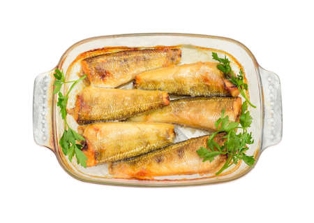 Baked notothenia fish in the glass casserole dishの写真素材