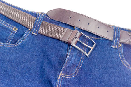 Casual brown elastic stretch belt for men with leather ends and classical buckle passed through the...