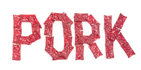 Word PORK whose letters are laid out with sausage slices of rectangular shape on a white backgroundの写真素材