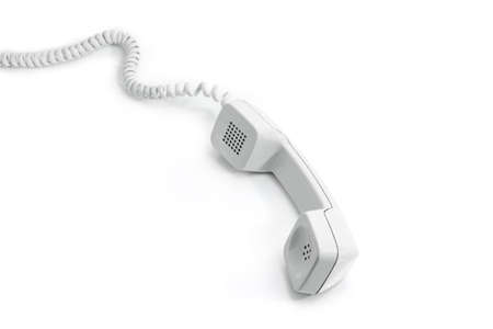Handset of modern landline telephone taken off from the phone on a white backgroundの写真素材