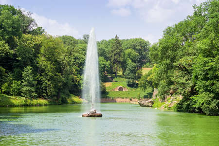 Lower Pond and fountain Snake in dendrology park Sofiyivka, founded in end of the 18th century in...