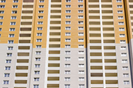 Fragment of the facade of modern multi story residential house at the end of construction の写真素材