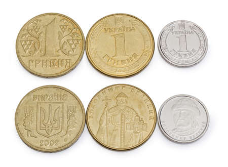 Averse and reverse of coins denomination one Ukrainian hryvnia, 2002, 2014 and 2018 on a white background closeupの写真素材